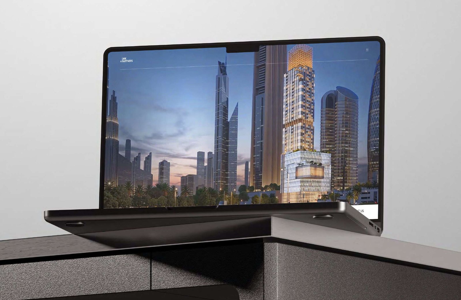 A laptop showing a website with the Dubai skyline