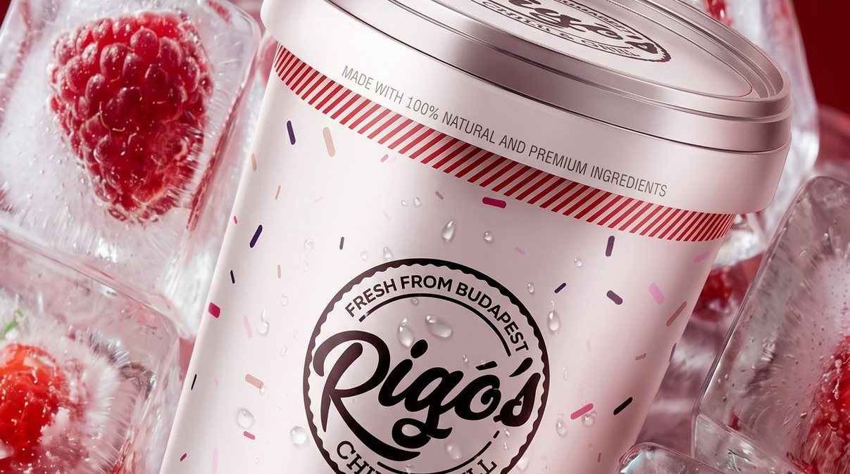An ice cream tub with fresh raspberries on ice, a studio product shot from our work